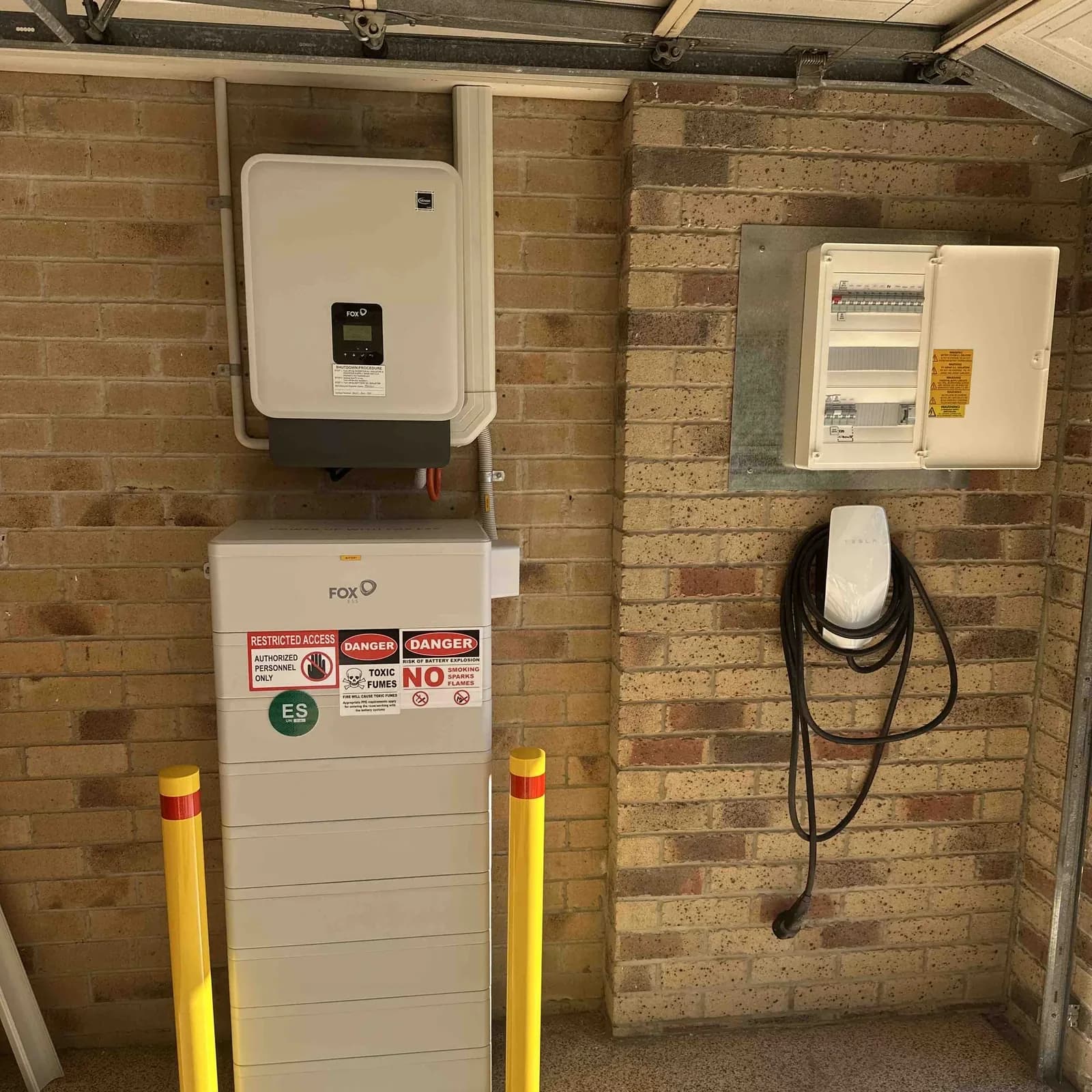 Fox ESS hybrid inverter, home battery and EV charger installed together under a carport