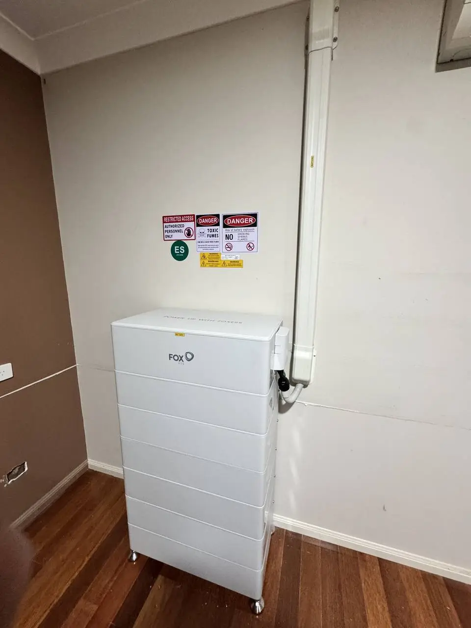 Wall-mounted Fox ESS home battery installed indoors