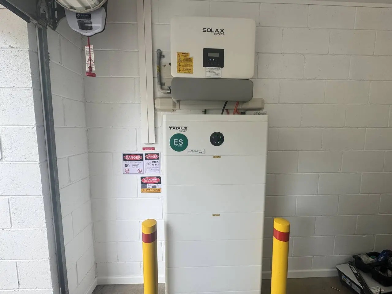 SolaX Triple Power home battery installed by Nuvolt Electrical in a Toogoom garage on the Fraser Coast