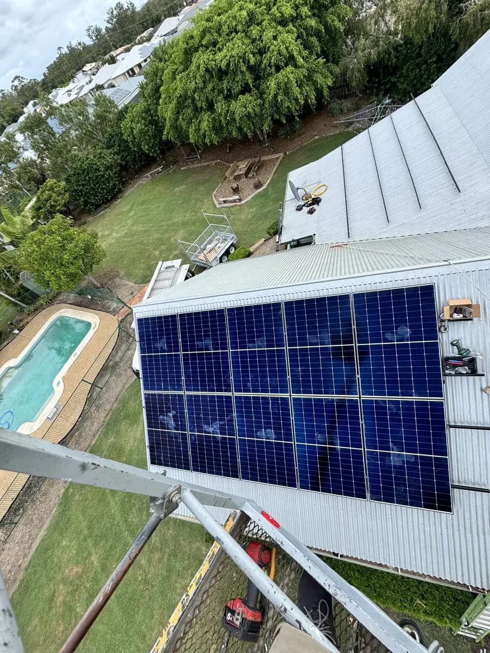 Aerial view of a hillside rooftop solar installation by Nuvolt Electrical in Bundaberg East