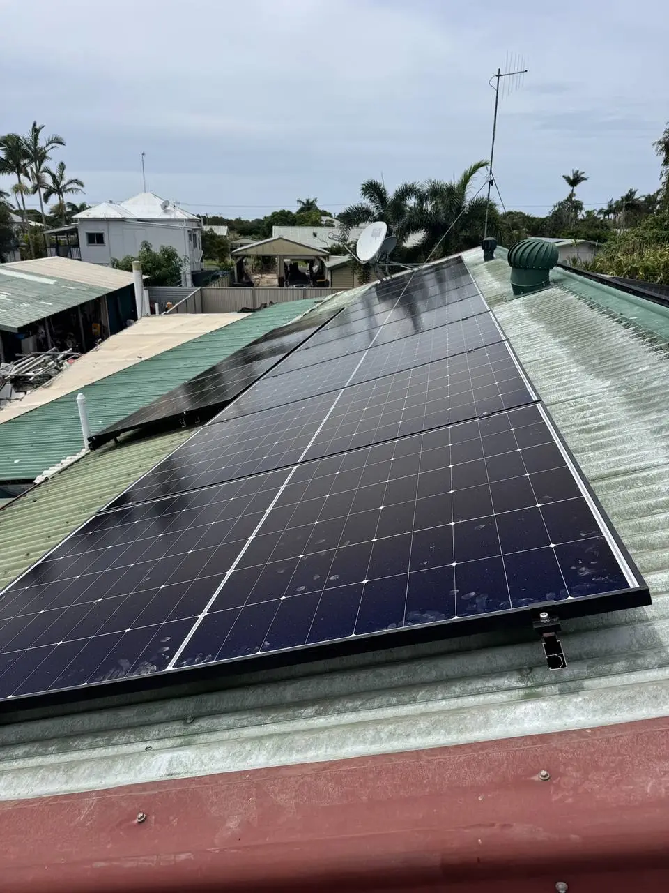 Full-roof solar panel array installed by Nuvolt Electrical on a suburban home in Burnett Heads, Bundaberg
