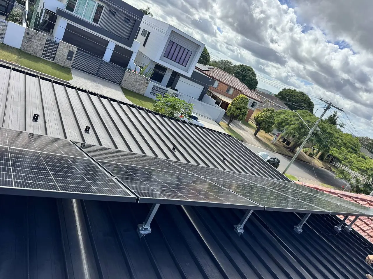 Tilt-frame rooftop solar array installed by Nuvolt Electrical in Robertson, Brisbane
