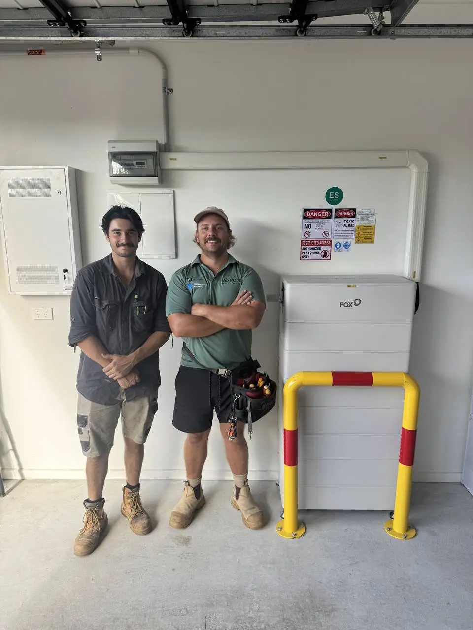 Nuvolt electrician signing off a completed home-battery installation